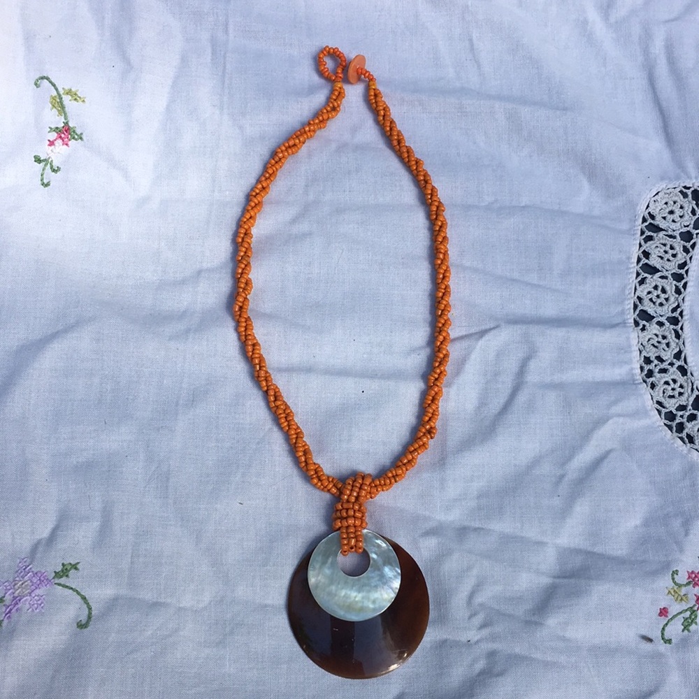 Large pendant beaded necklace